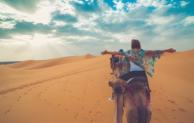 camel ride in moroccan sahara merzouga by tourist